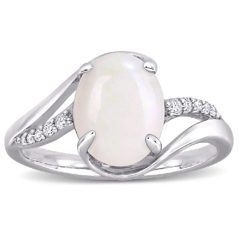 Miadora Sterling Silver Oval-Cut Opal and 1/10ct TDW Diamond Bypass Ring